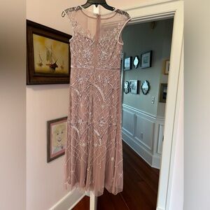 Beautiful dusty rose beaded gown size 2petite.